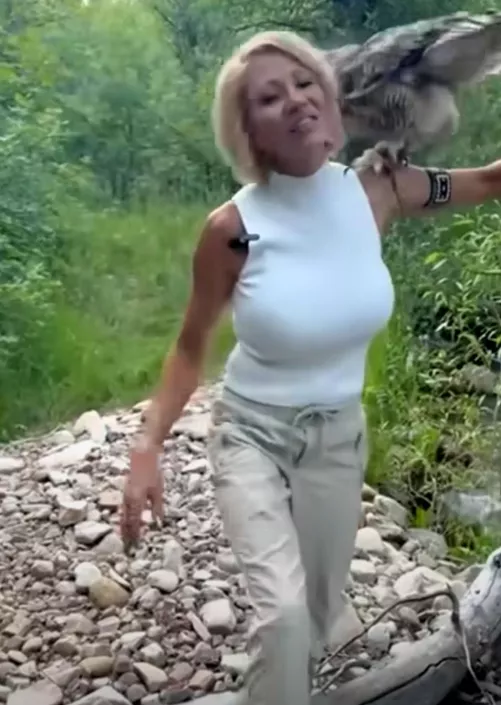 40ish milf walking her owl and hooters. by Badbullet65