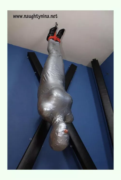 Fantasy #861 utter helplessness. I know being upside for extended periods of time can be very dwngerous but man I would love to be upside down and wrapped, losing all sense of spatial feeling, bonus for ear plugs so I can't hear anything. by NefariousnessWest354