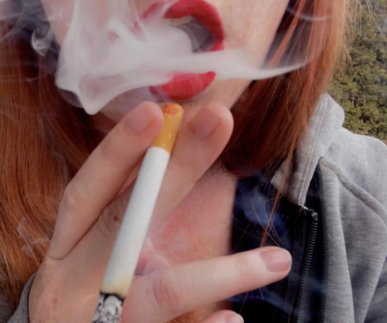 Don’t you love how red lips look with smoke?  posted by Ellexandrea28