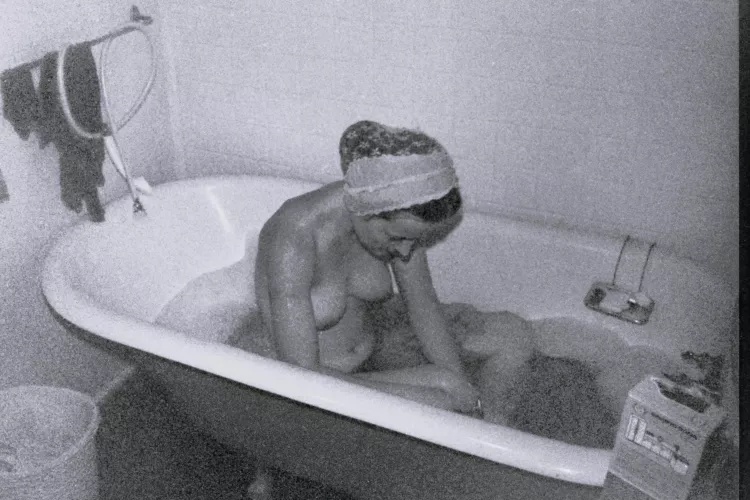 Yes, my turn for a bath! During cold weather, Saturday night was warm bath night on our hippie commune - this old tub kept the water warm. Early 1970s. by thighsgentlyparting