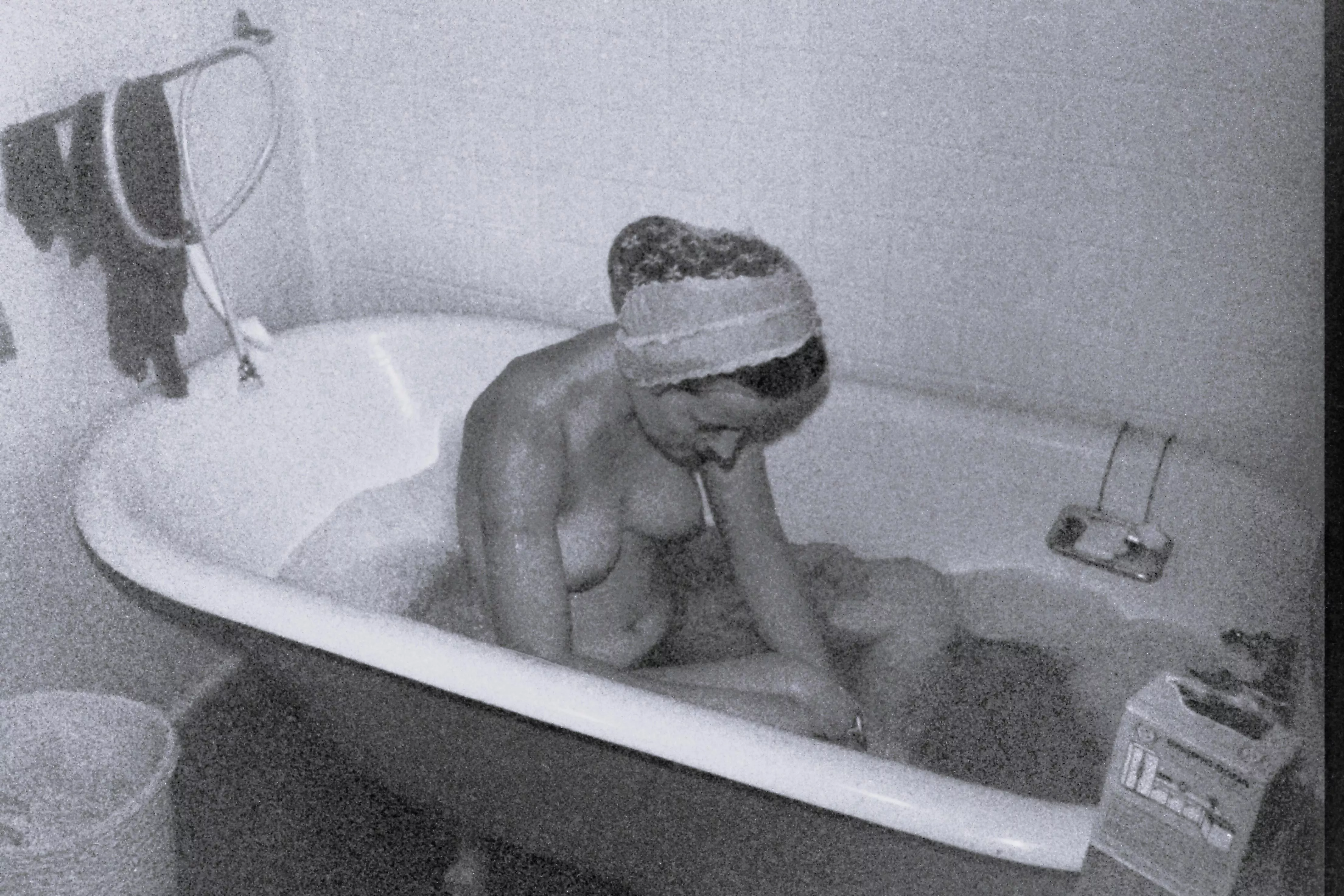 Yes, my turn for a bath! During cold weather, Saturday night was warm bath night on our hippie commune - this old tub kept the water warm. Early 1970s. posted by thighsgentlyparting