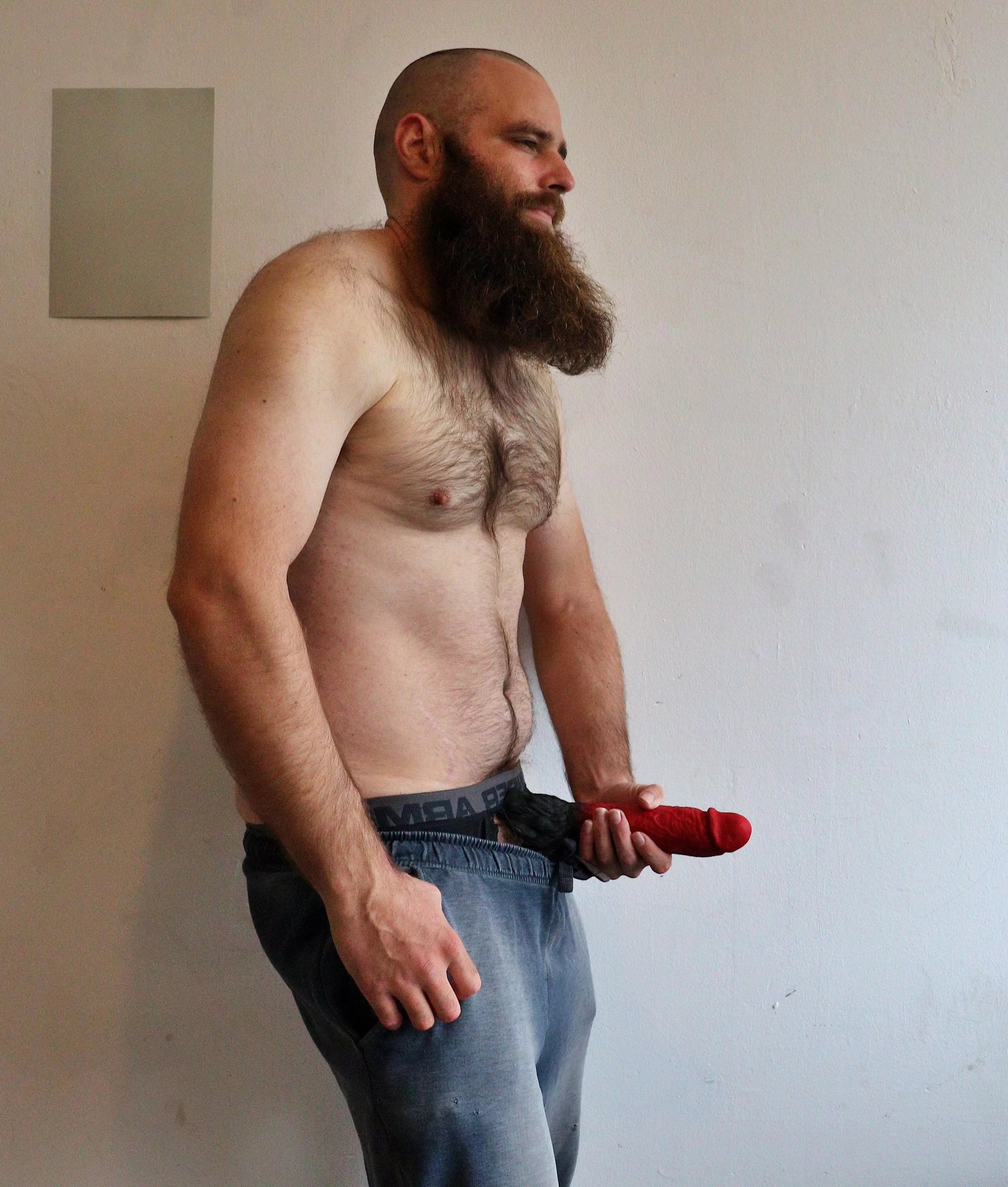 Me, while I'm holding a large dildo in front of myself posted by Mysterious-Man1