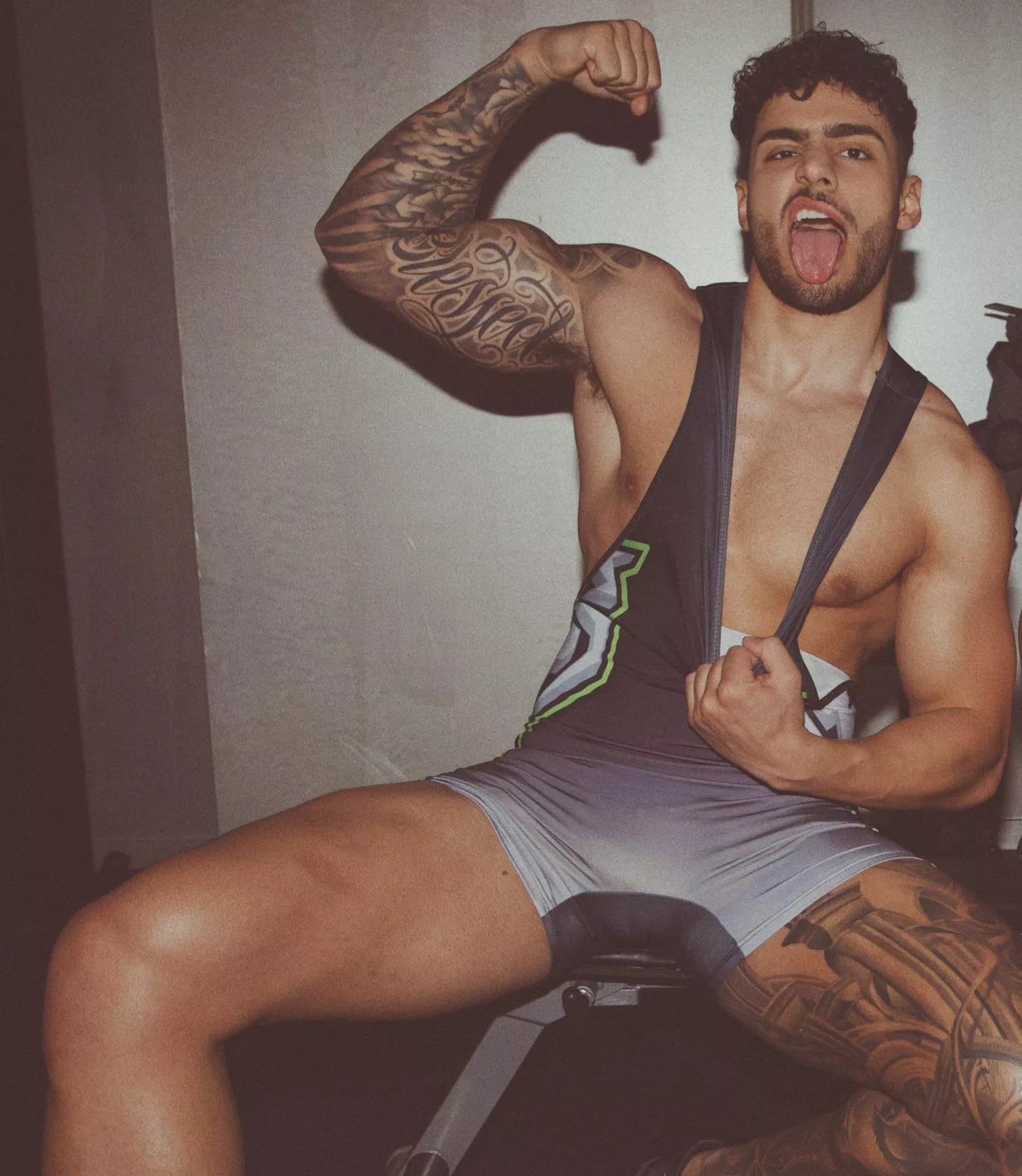 Flexing in singlet  posted by DaveANDRob