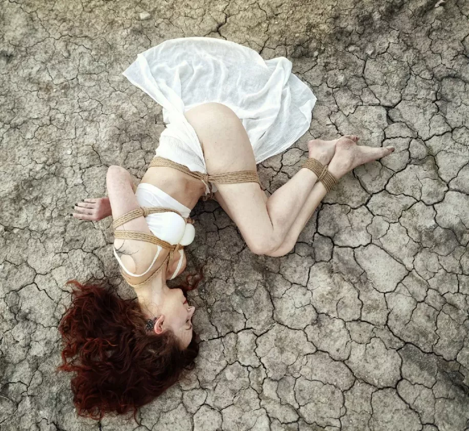 Needing help identifying tie around her waist and thighs please! Thanks posted by almaperdido