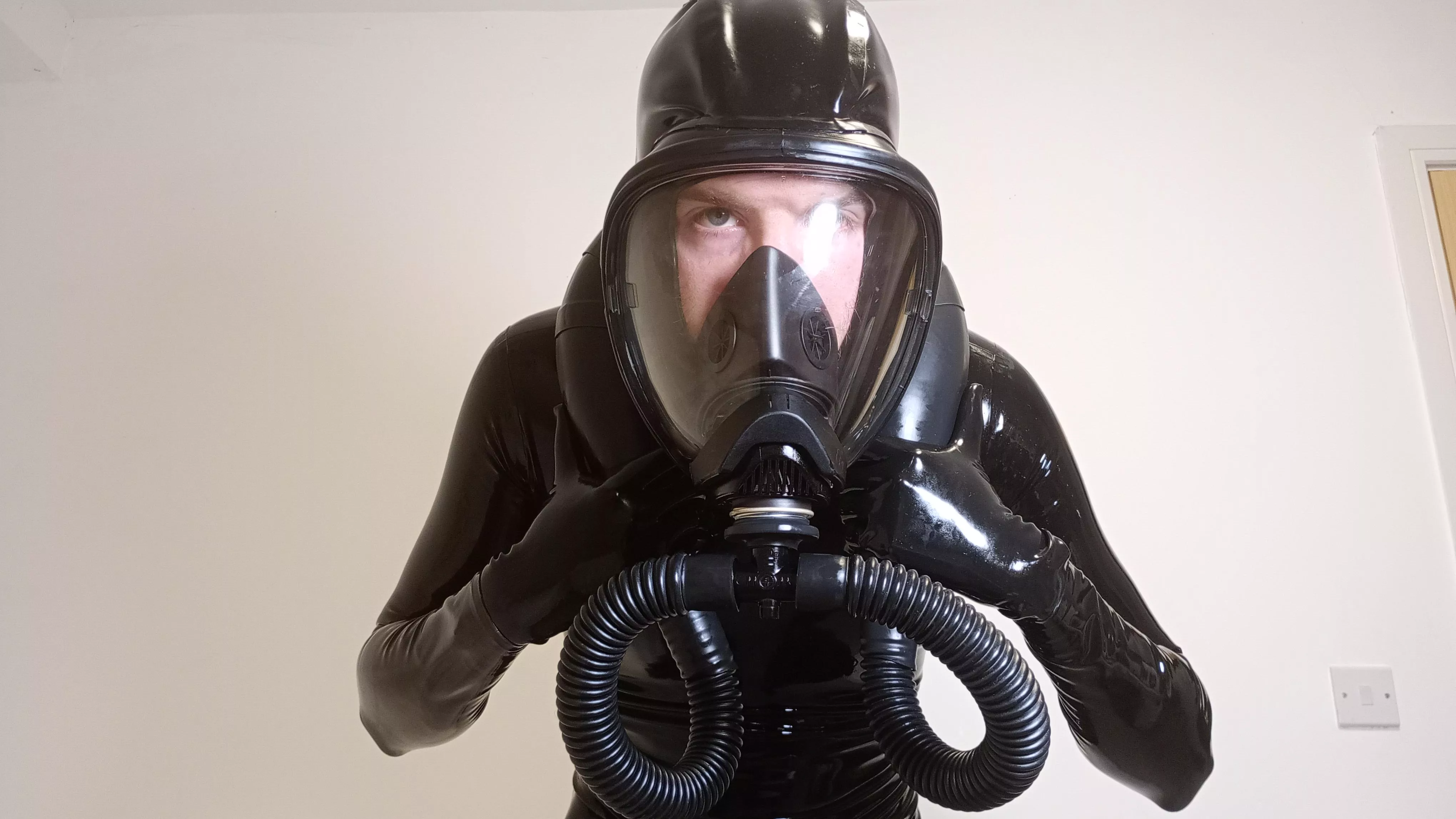 Hooded gas mask makes full enclosure easier posted by TheRubberyGuy