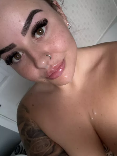 Smiling because of the big load on my face by Tattooedblond3