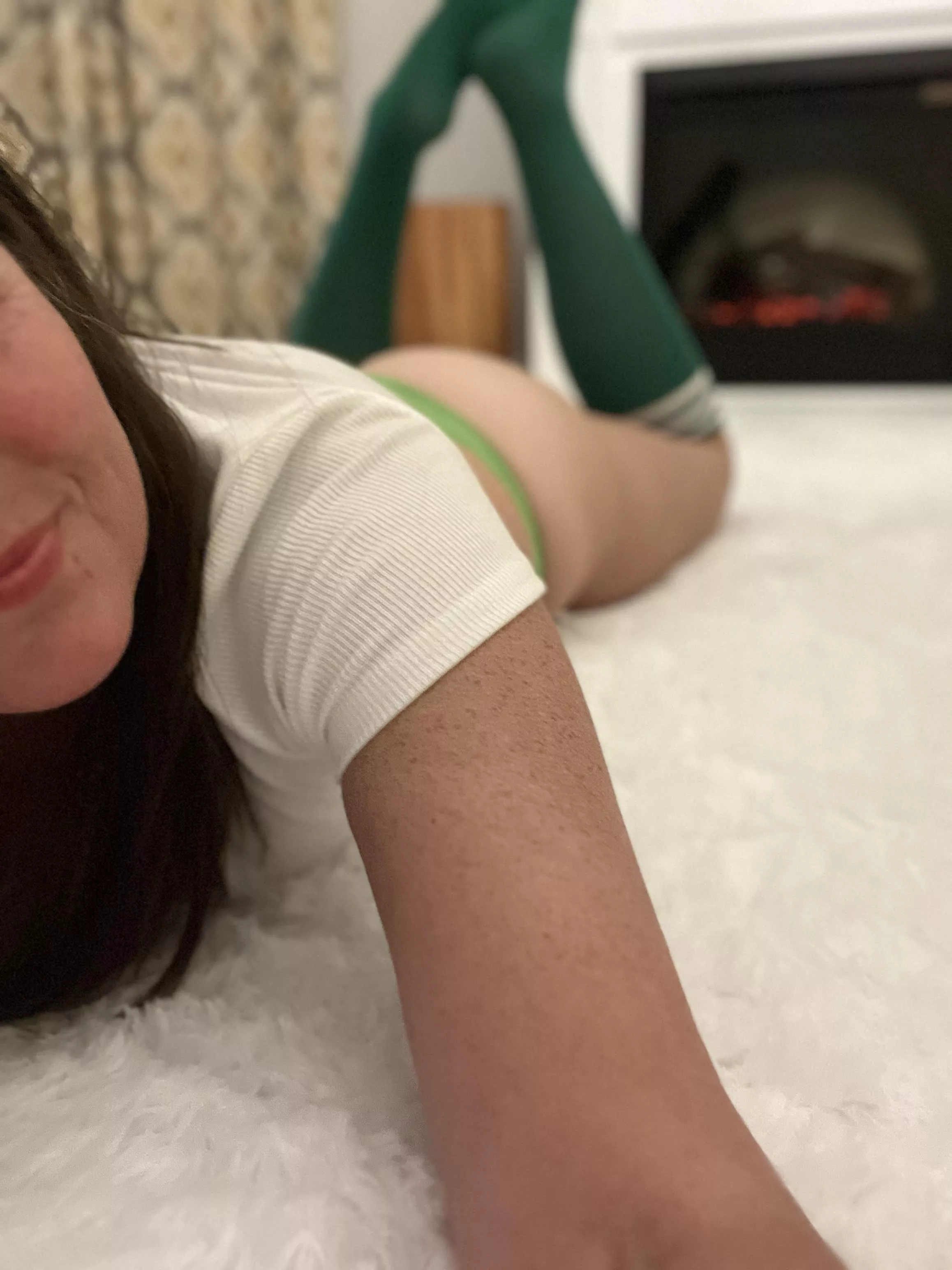 Cheeky in my green socks today [f] posted by SoleDependency