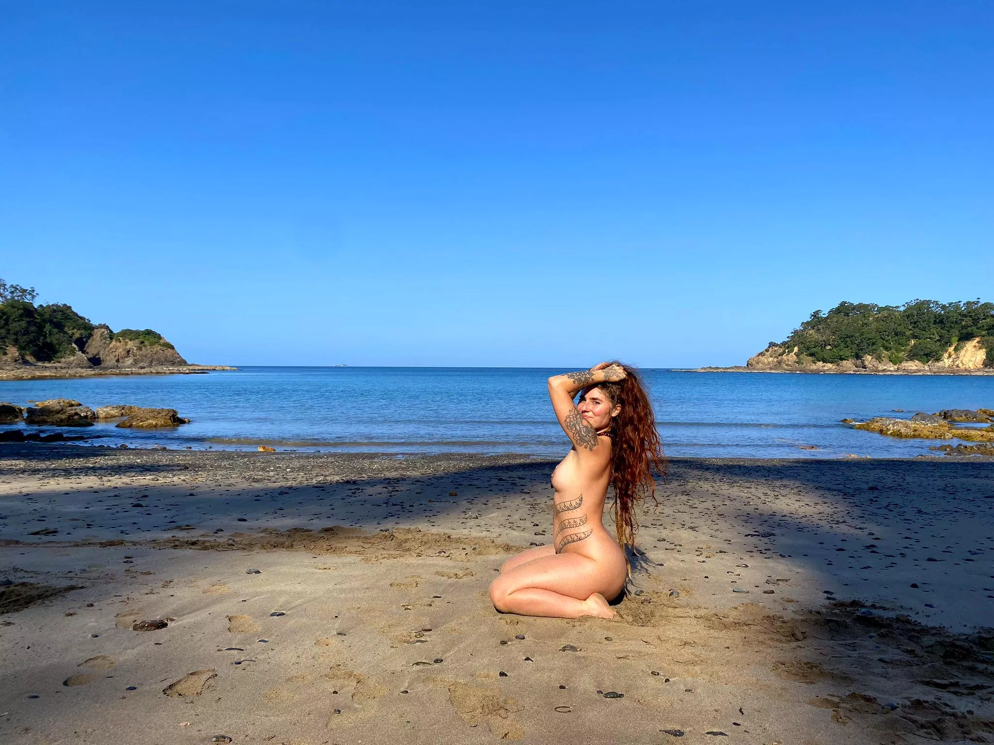 Naked and barefoot on the beach. posted by itsandreeaXO