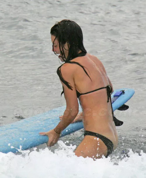 Evangeline Lilly Surfing by FitParsnip7427