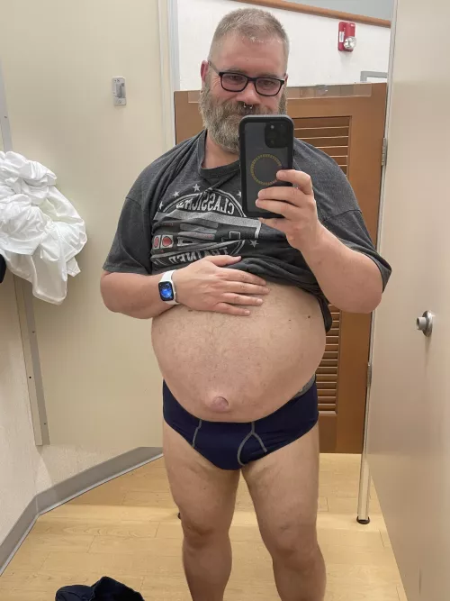 Trying on some clothes.  by nlyesac