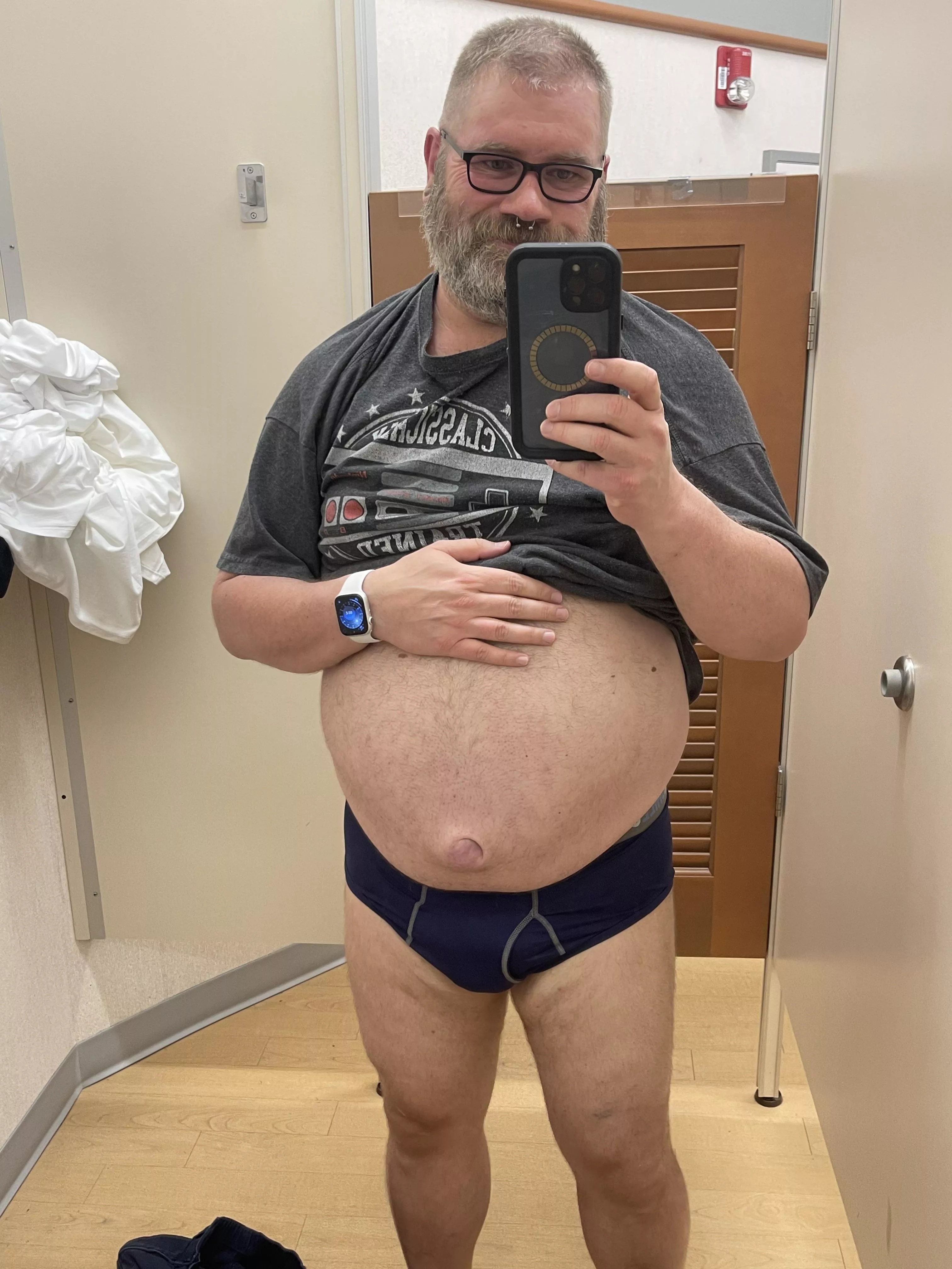 Trying on some clothes.  posted by nlyesac