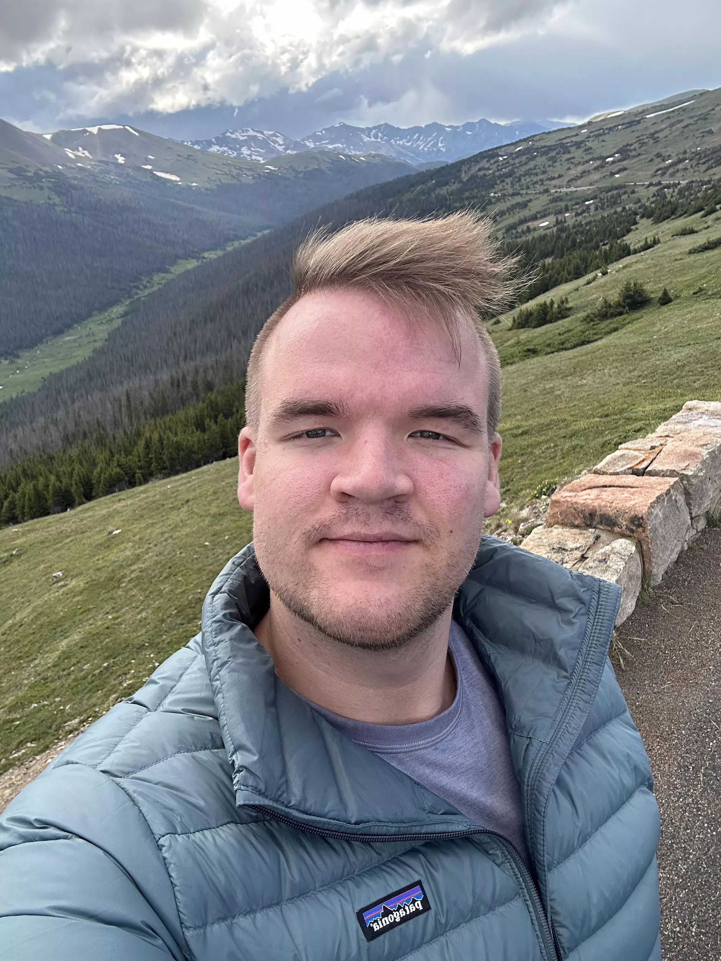 A man on a mountain posted by Photo_Nomad