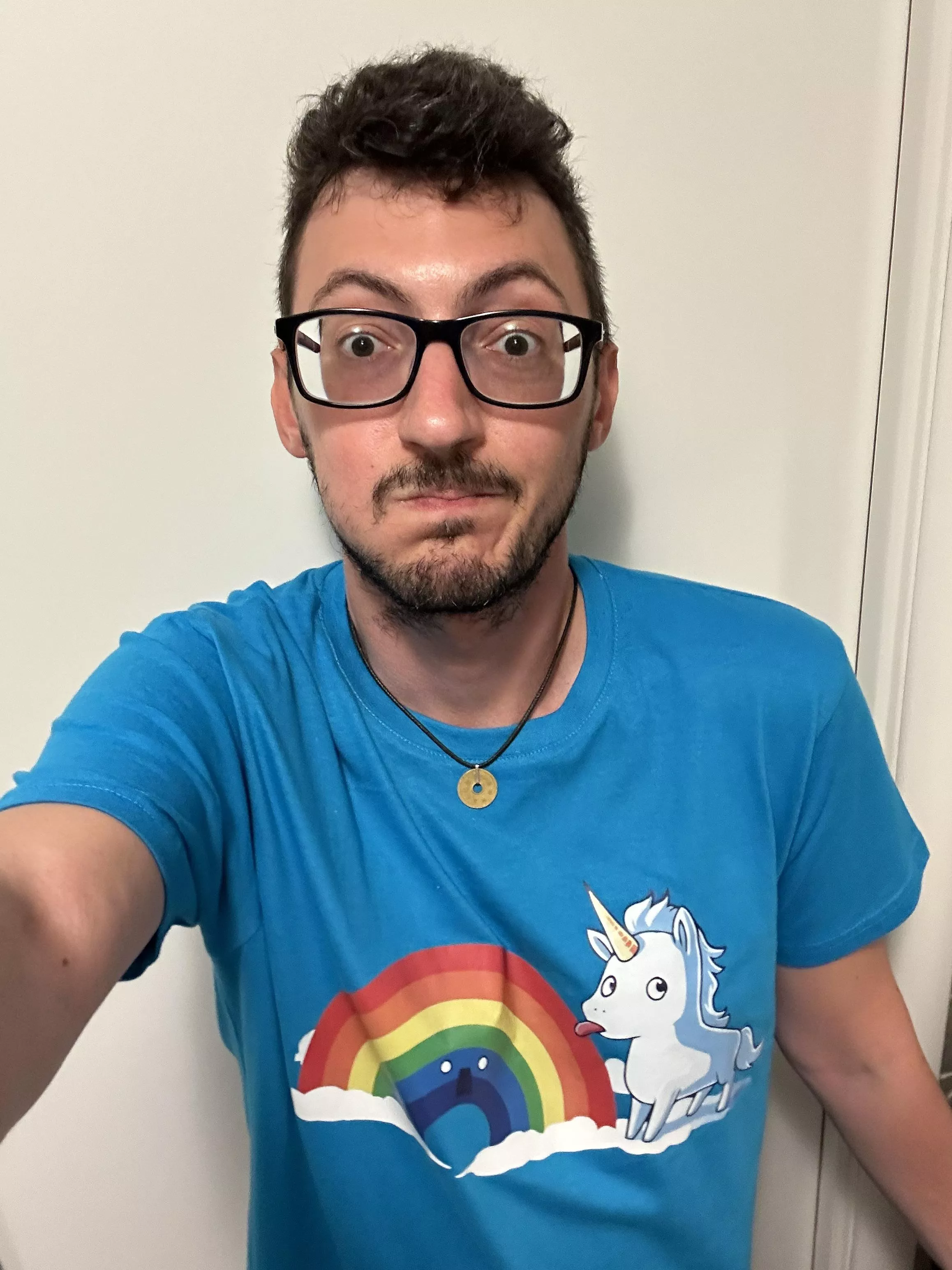 Back to silly shirts. With silly face too. Licking rainbows 🌈 posted by LuxusLuxray