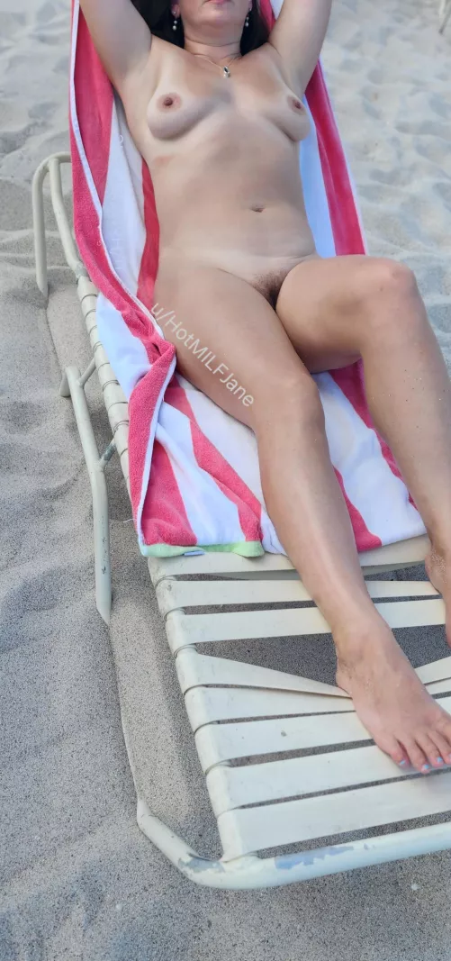 Enjoyed sunbathing nude at clothing optional beach by HotMILFJane