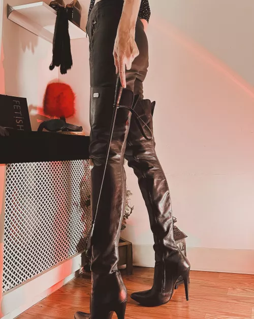 Listen up slave. My crotch high boots want to be worshiped & my leather pants are demanding your attention by MistressBurns
