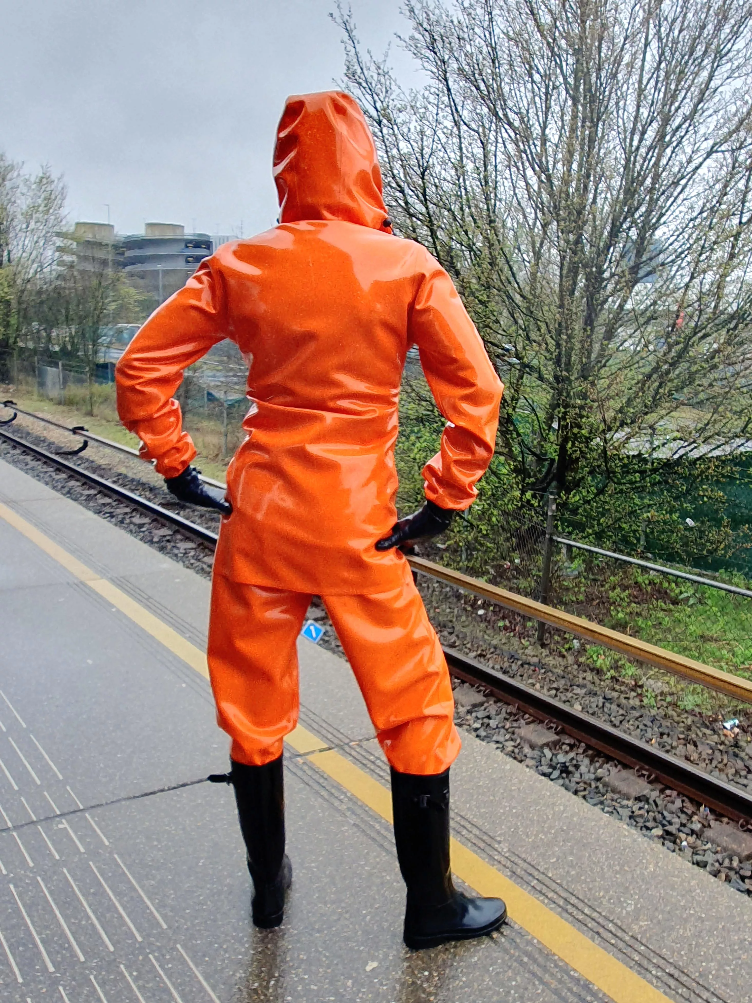 Wearing my thick latex rainwear on the subway!  posted by LatexLovingLady
