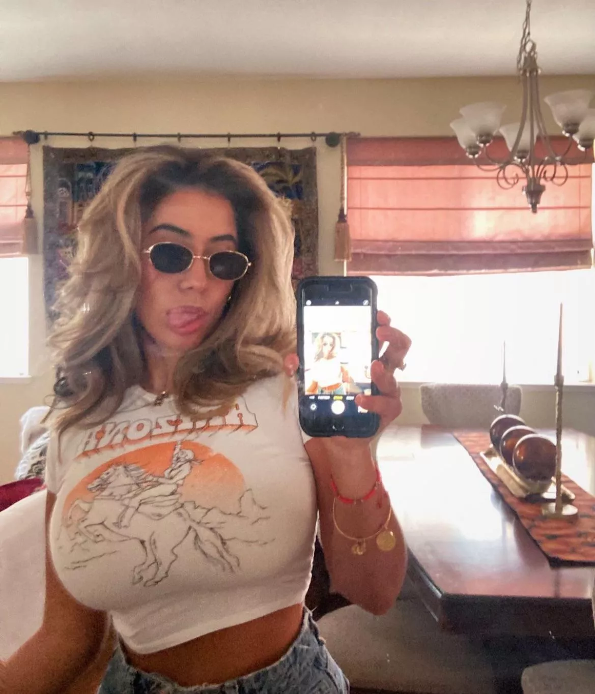 Shades and a t shirt  posted by Serious_Ad8207