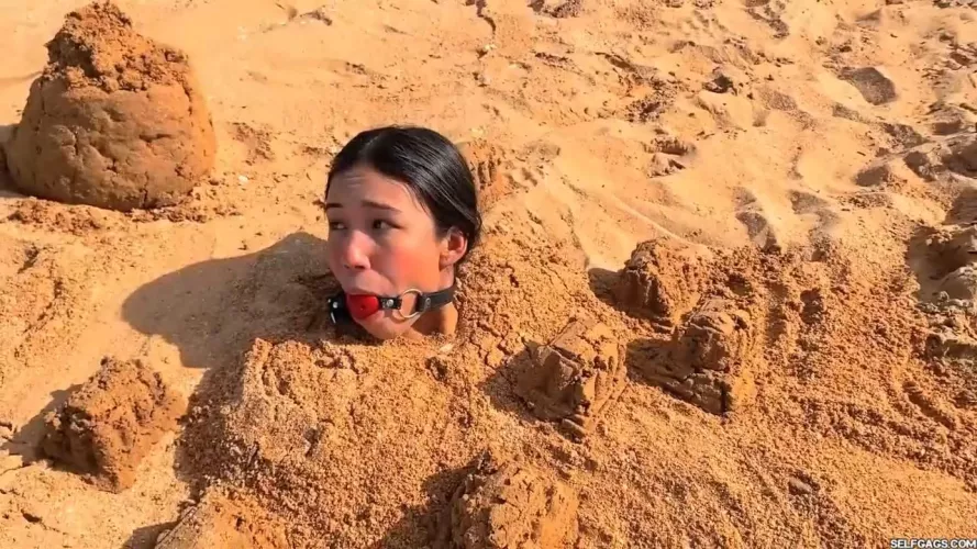 Does being buried in sand count as Outdoor Bondage? by Selfgags