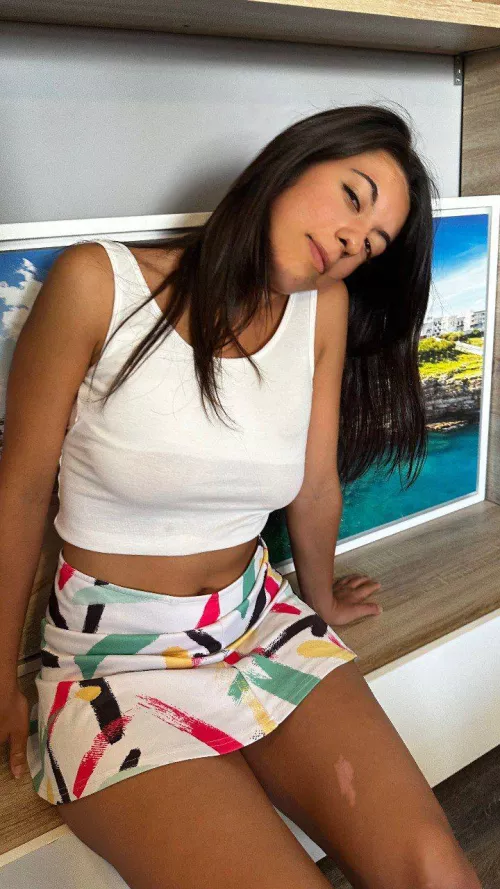 leaning on the wall, feeling flirty in colorful skirt babe by DazzlingxAngel205