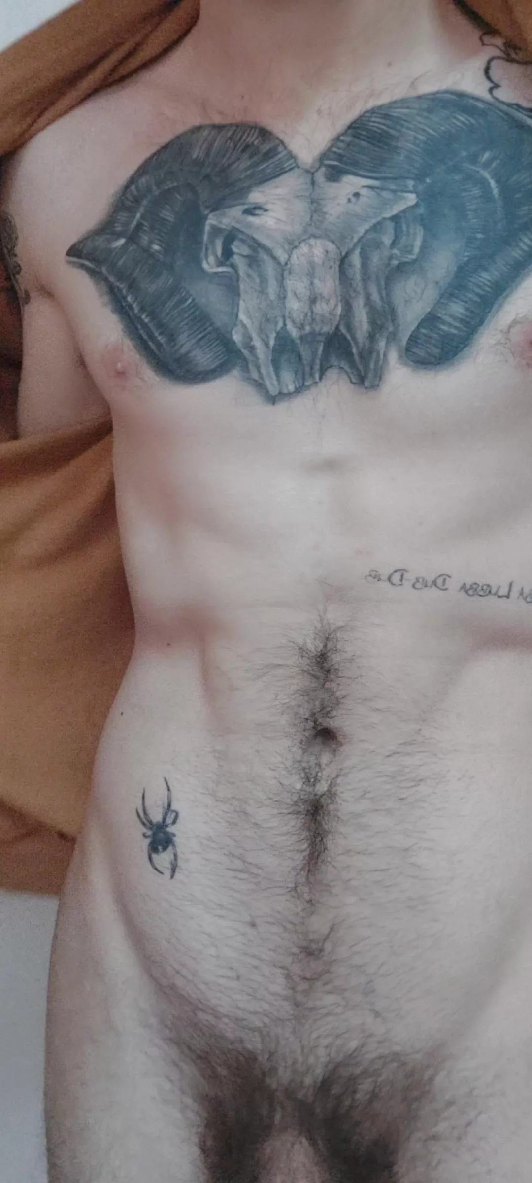 Tatted and slightly hairy posted by Acrobatic-Bake2084