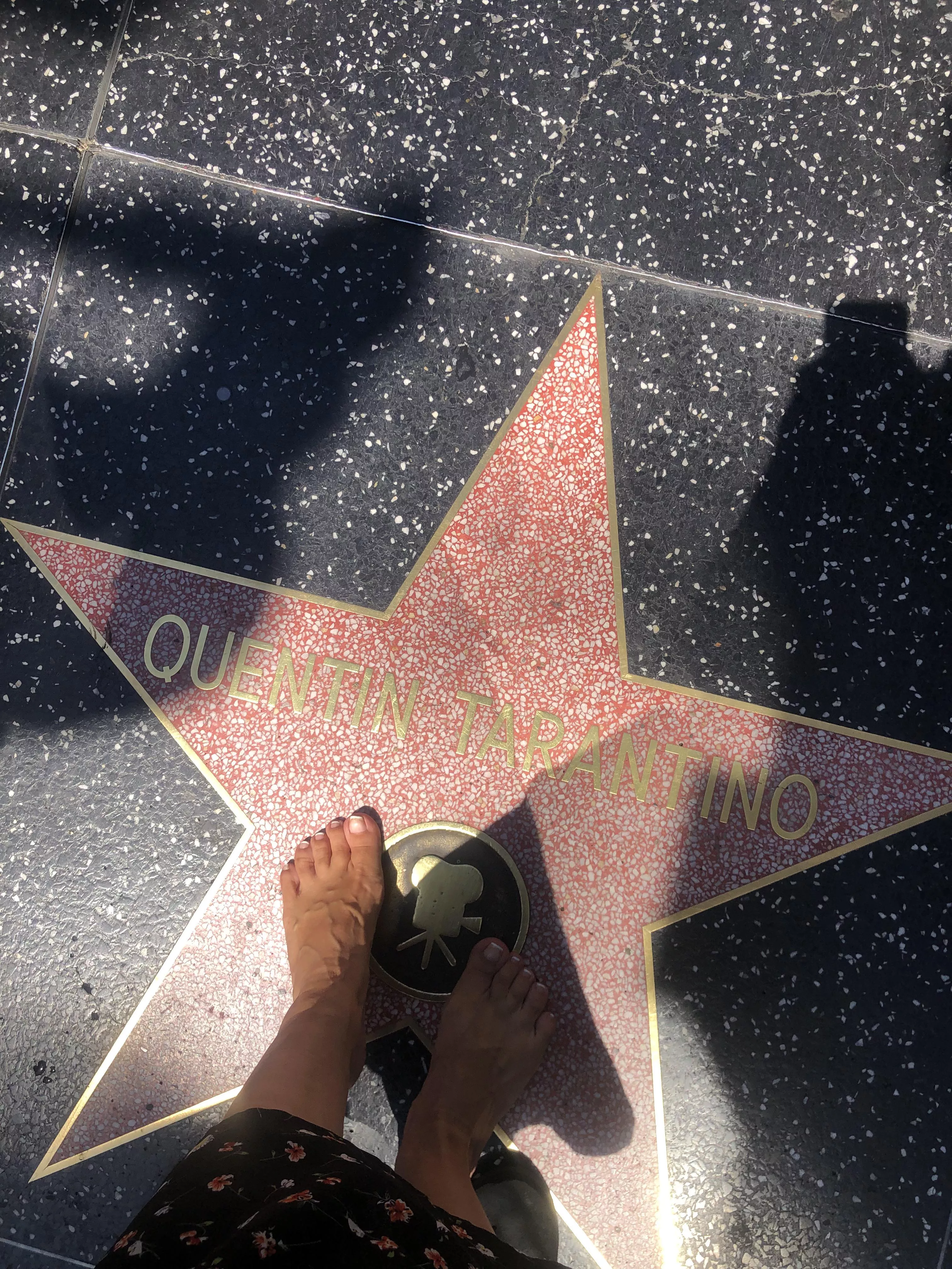 I had to take a picture of my feet next to this star...Do you know why? posted by albastoes