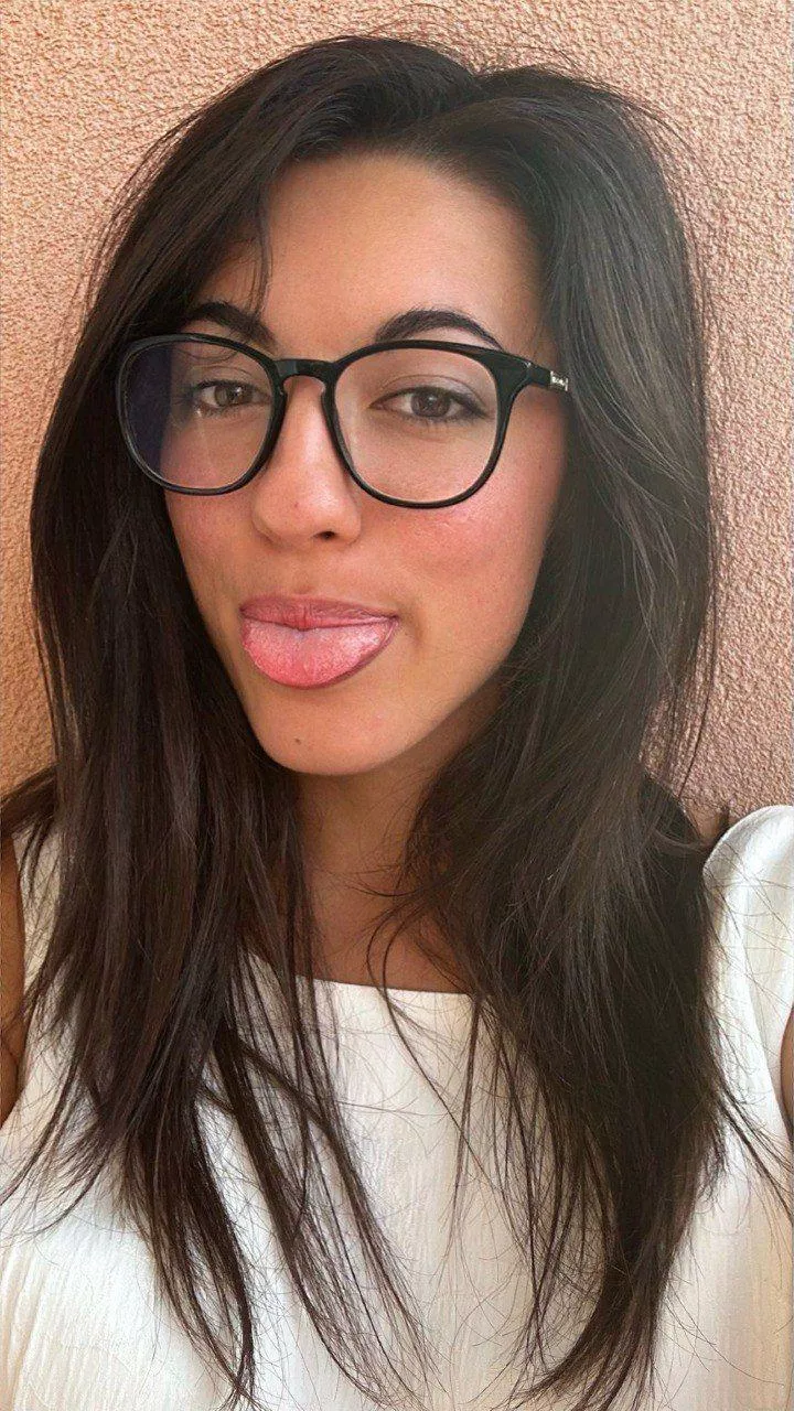 glasses on, tongue teasing, want my playful-loving vibe babe posted by DazzlingxAngel205