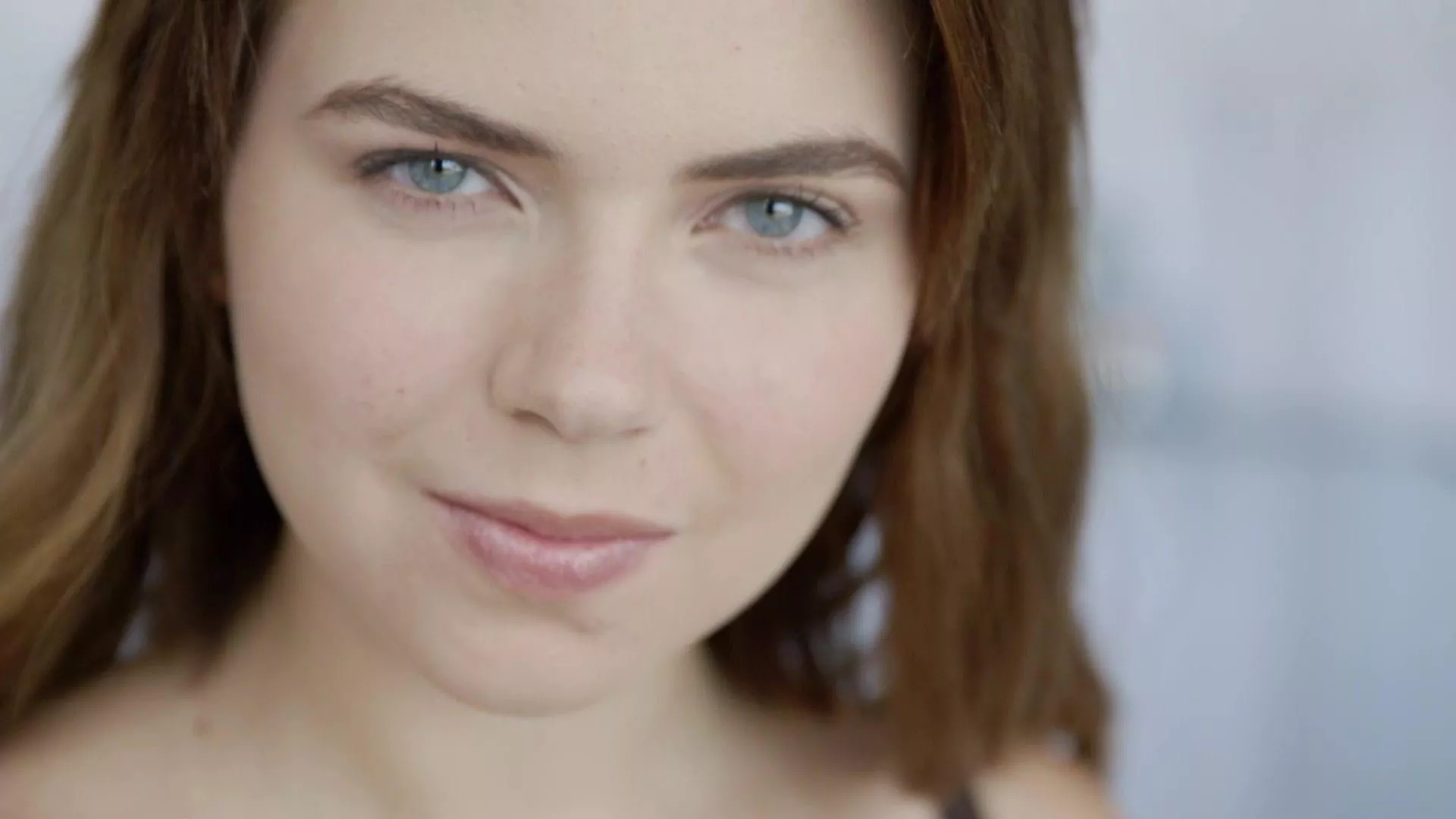 She has lovely eyes posted by SarasCaptions