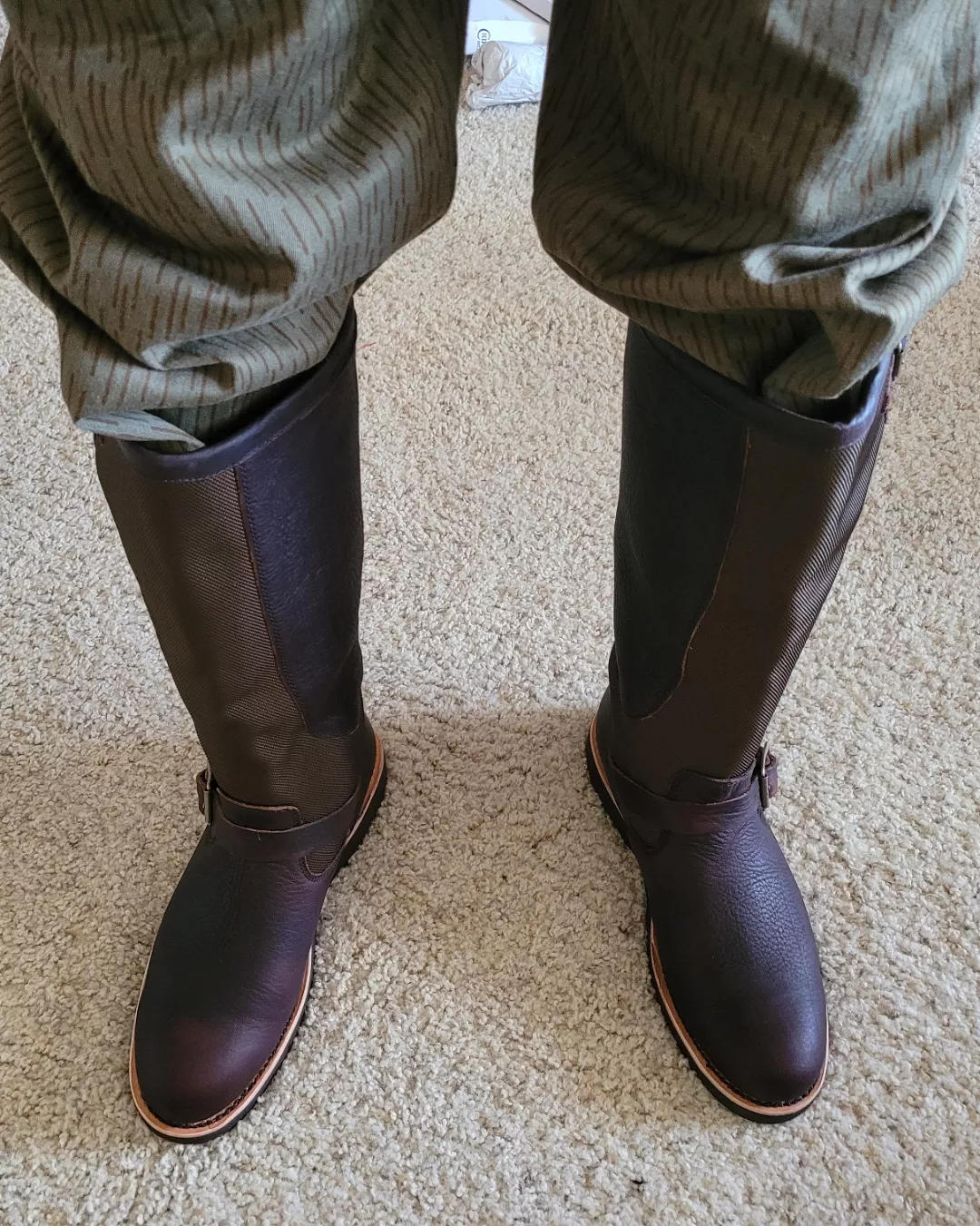 Bought some Chippewa snake-proof boots for general outdoorsy wear. They fit just fine on around the toes but are a tad loose at the heel. Will this be fixed by the normal break in period? posted by FrederikFininski