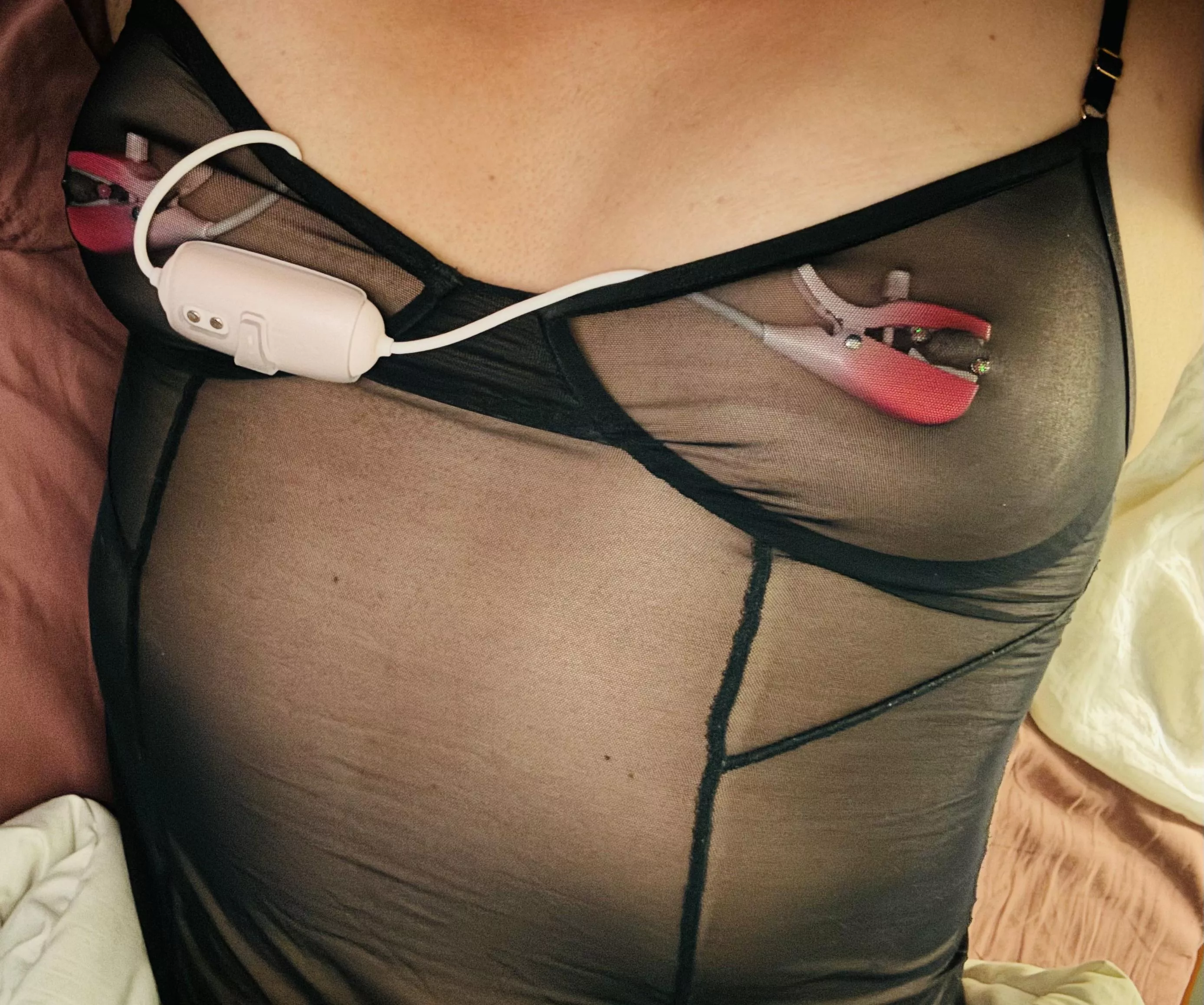 Vibe clamps attached to my pierced nipples posted by overundermoon