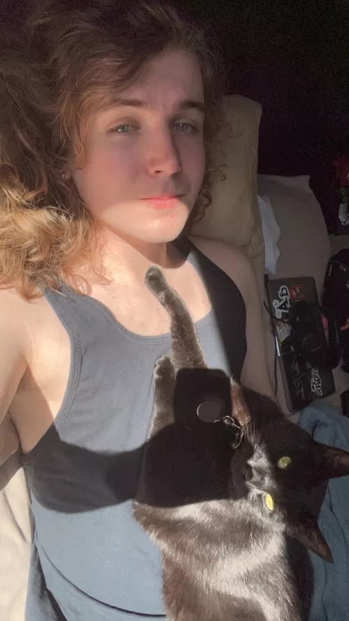 currently enjoying the sun with my cat, anyone wanna play some LoL later? (na) by Glum-Calendar-3373