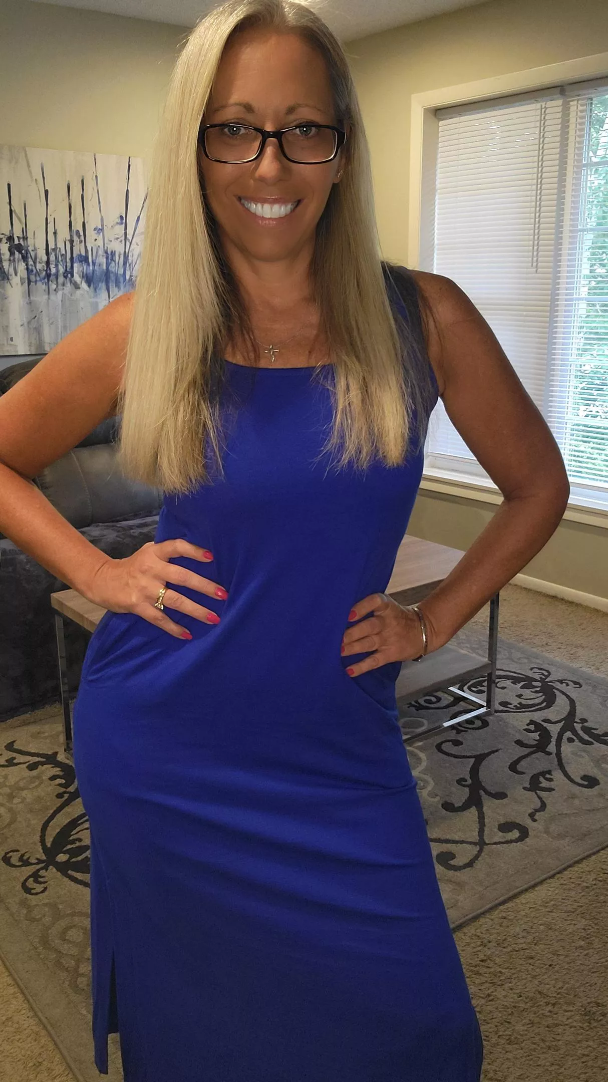 Blonde, check, blue, check. Real 52yo woman, check! posted by Unhappy-Peak2683