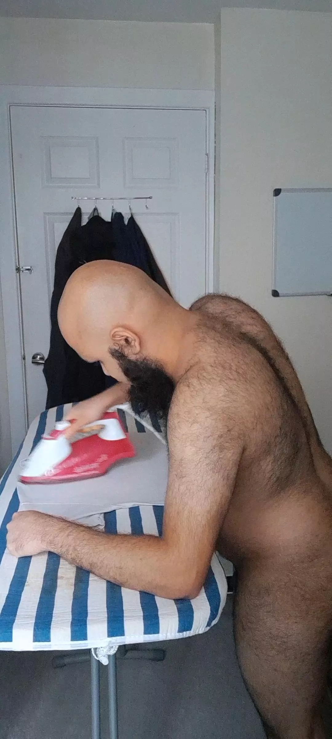 Ironing my cloths, being naked help with the heat posted by Iamshamful