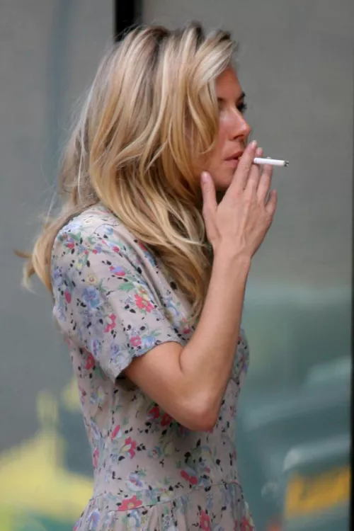 Smoking woman candid by smokingandaesthetics
