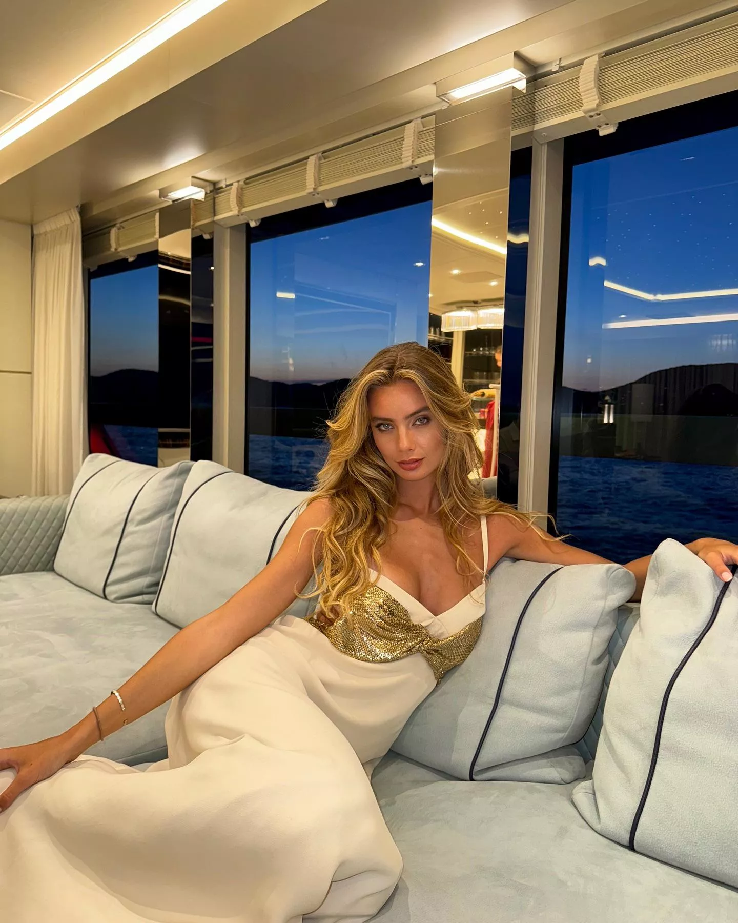 Beautiful girl on an expensive boat posted by DlngoLex