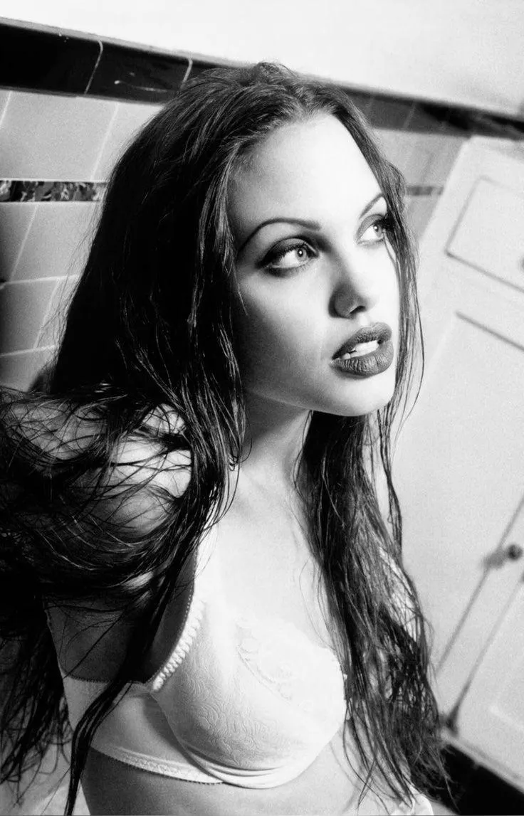 Angelina Jolie in the 1990s posted by petracook