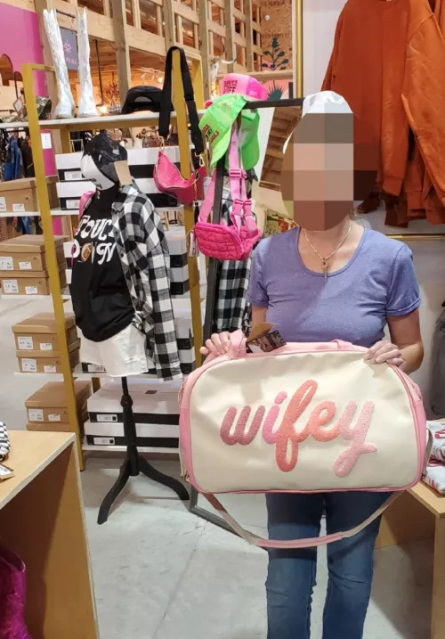 Flashback! Had to get this picture. We were out and stopped at a place that had several fancy boutiques etc and ran across this bag if you scroll way back you will find another post where I posed with this bag at a mall on a trip somewhere else.  by KeyholderK