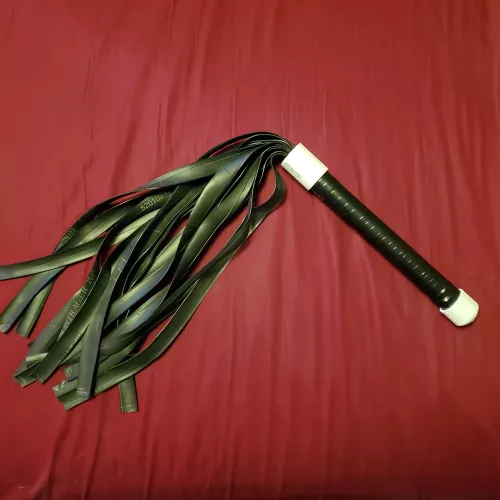 Rubber flogger made from an old bicycle inner tube by AMultitudeOfSins