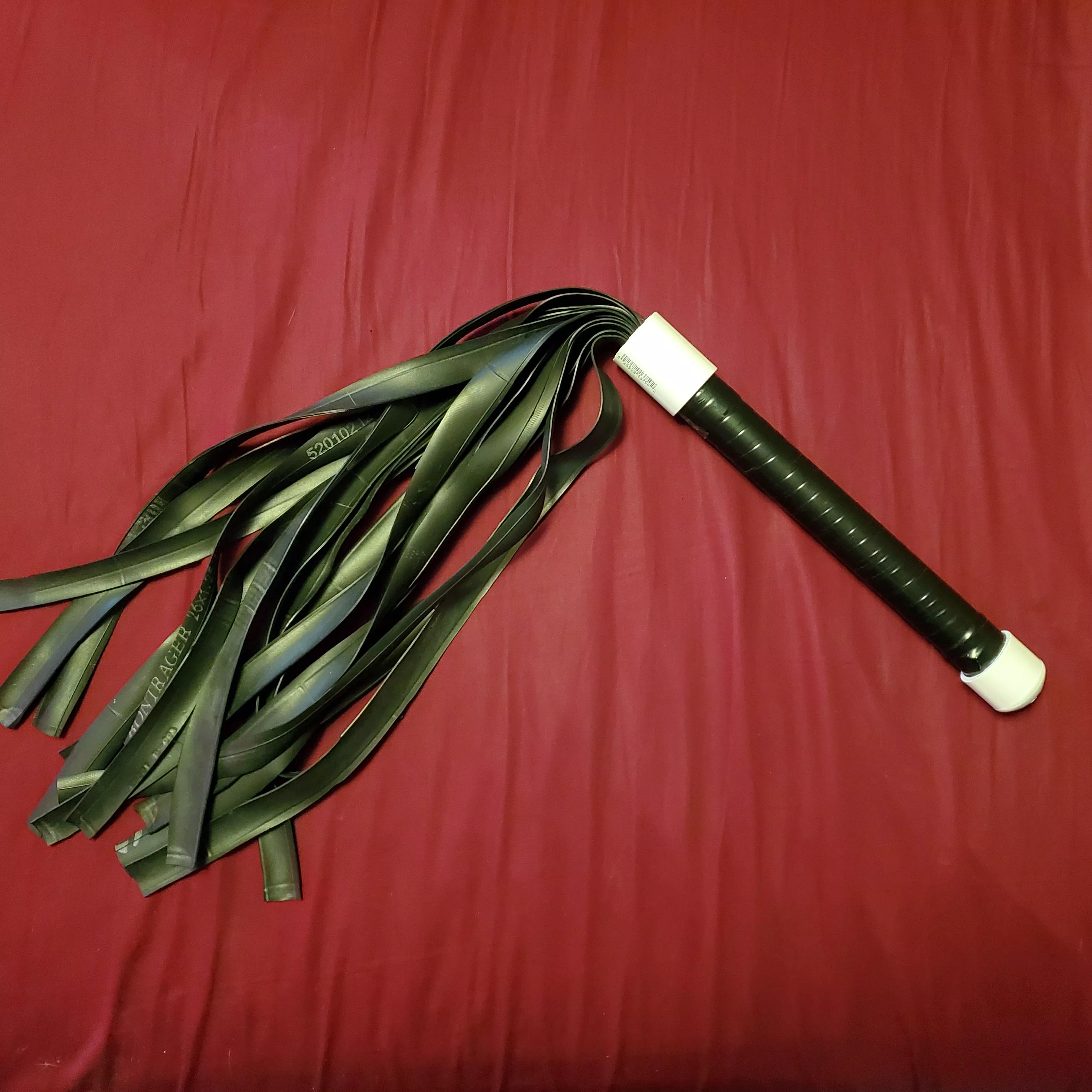 Rubber flogger made from an old bicycle inner tube posted by AMultitudeOfSins