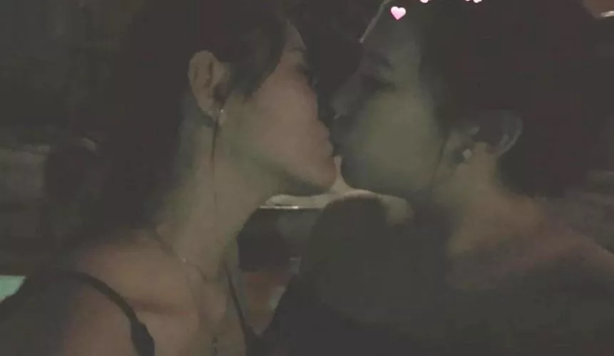 Girls kiss in pool by NancyHuynh1231