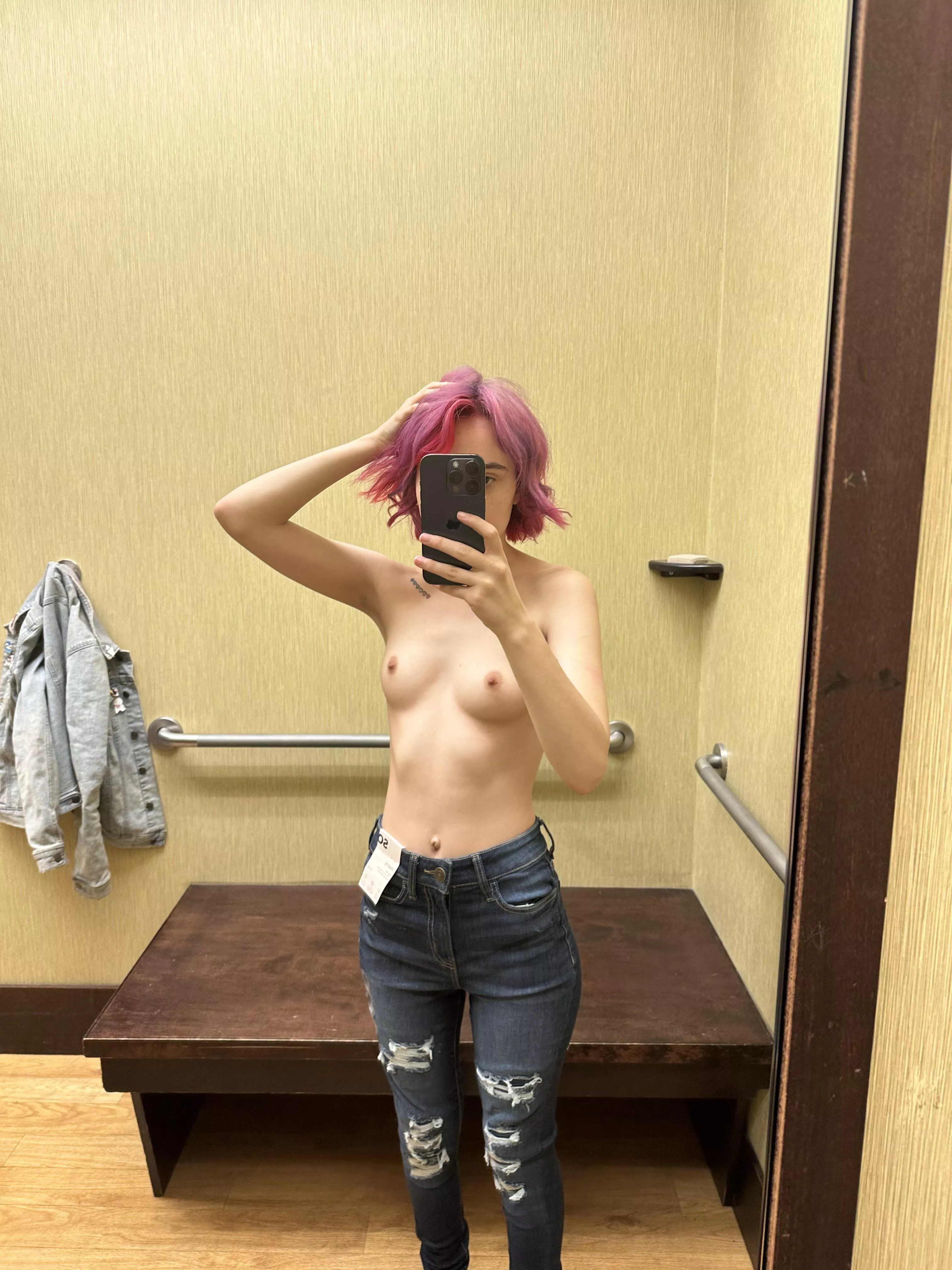 just topless in a changing room posted by iambatmansbff