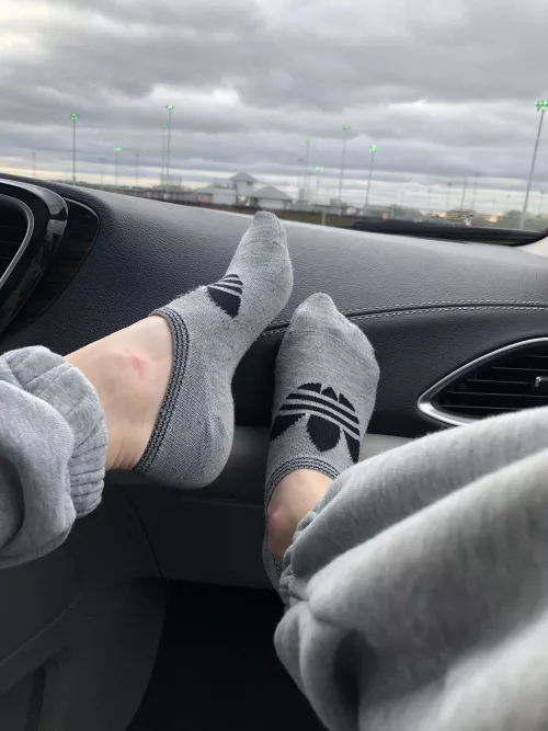 Feet staying cozy in these socks on a cold rainy day by Footprincess156