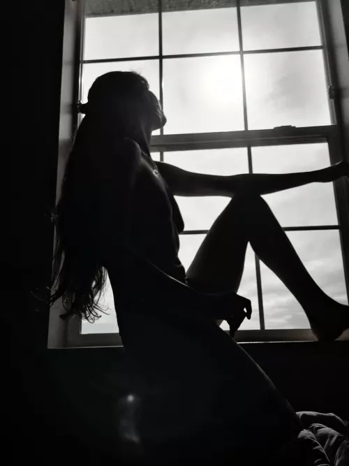 Sitting in the window by Sunsh1neBaby