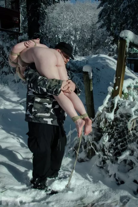 Bad girls get bound and taken to the snowy forest. posted by Slave_Schatz