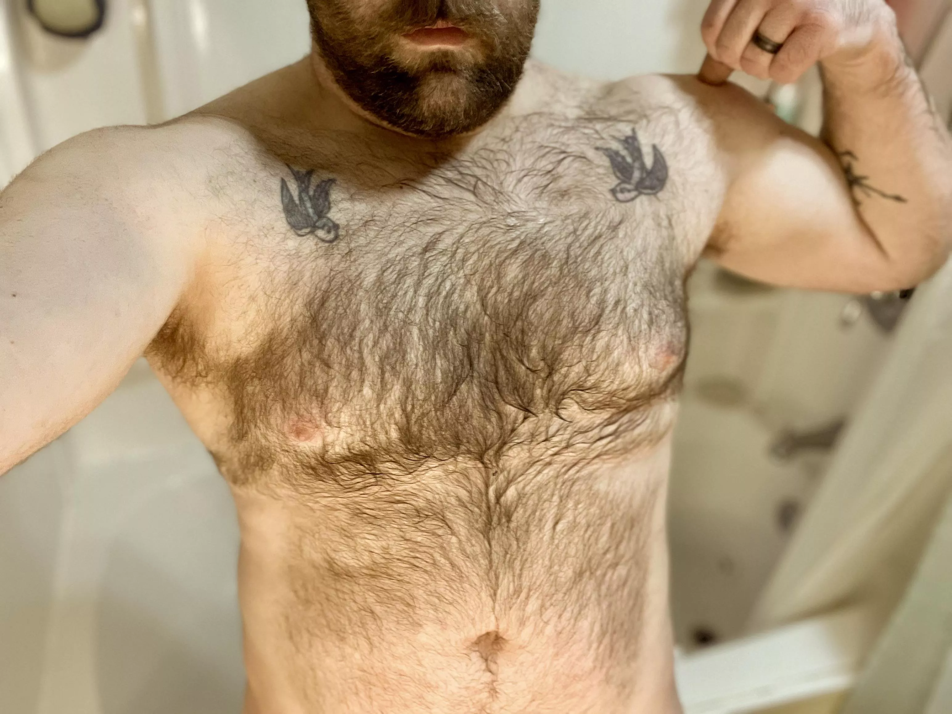 Chest hair still wet from the shower 😘💦 posted by skooliefamilyjourney