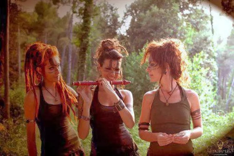 Red Dreadlocked flute players in the woods by Imaginary-Ebb1932