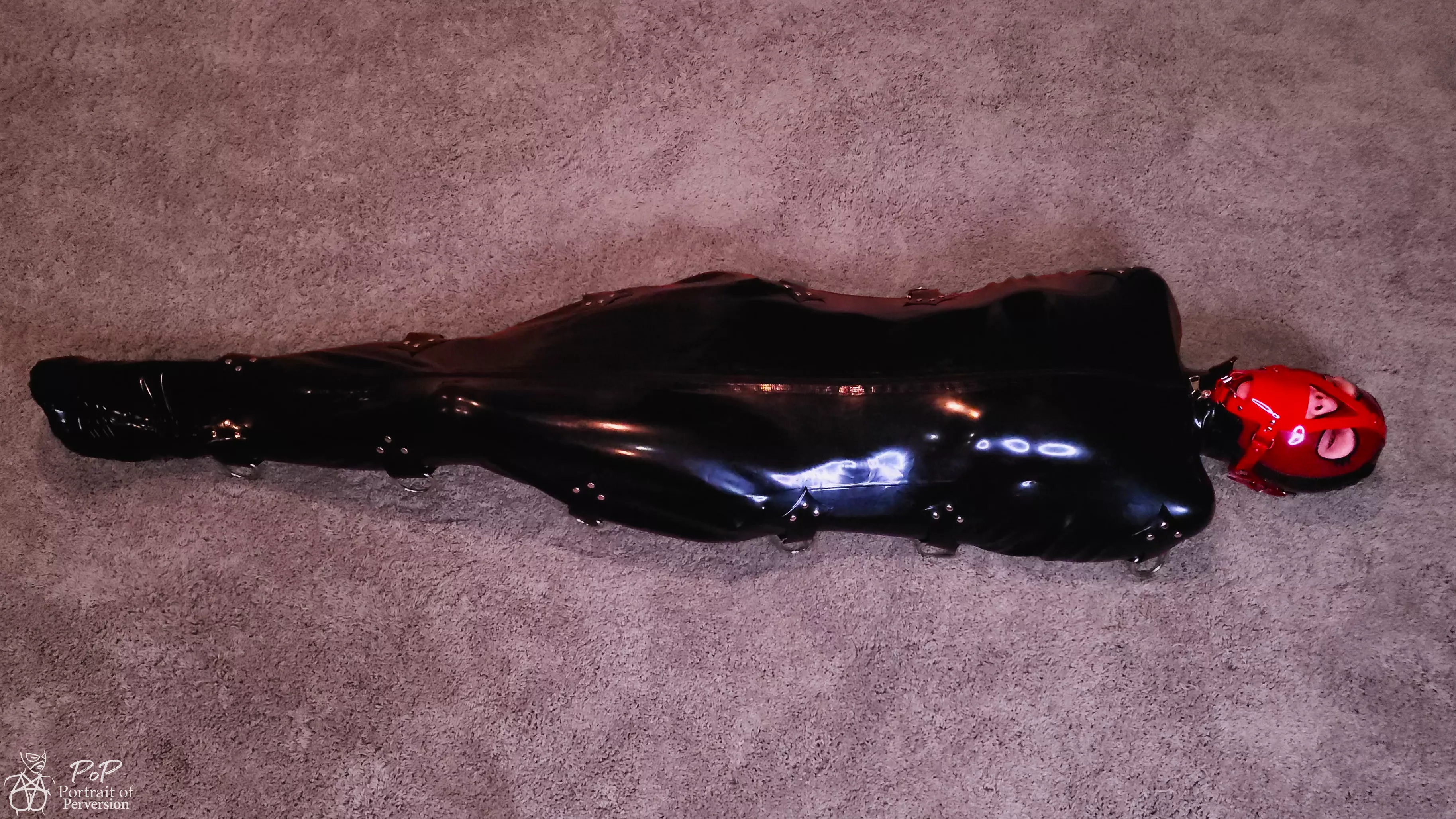 I love being trapped in tight latex! posted by PortraitOfPerversion