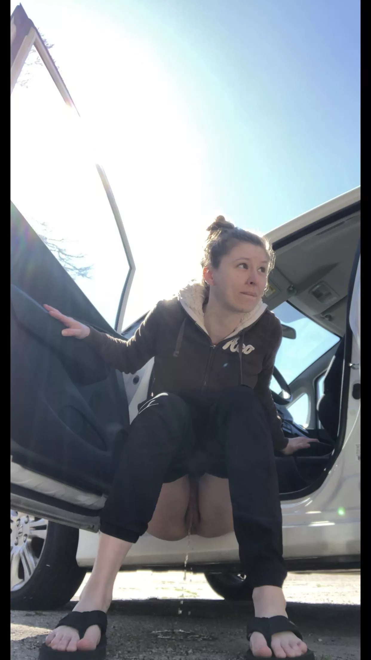 Peeing in a public parking lot 💛 hope I don’t get caught! posted by oh-honey-onlyfans2