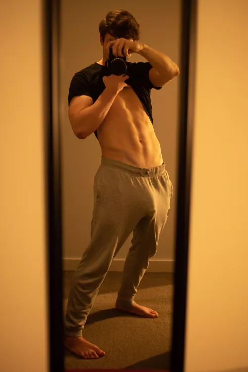 Bulging out of my favourite pair of sweatpants by Maple_Cock