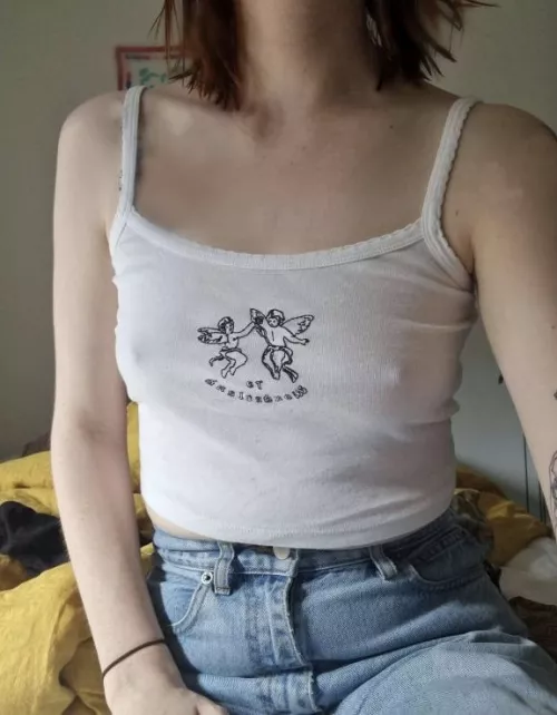 The top says 'to wonderland'. I think it's accurate. by hayleyundone