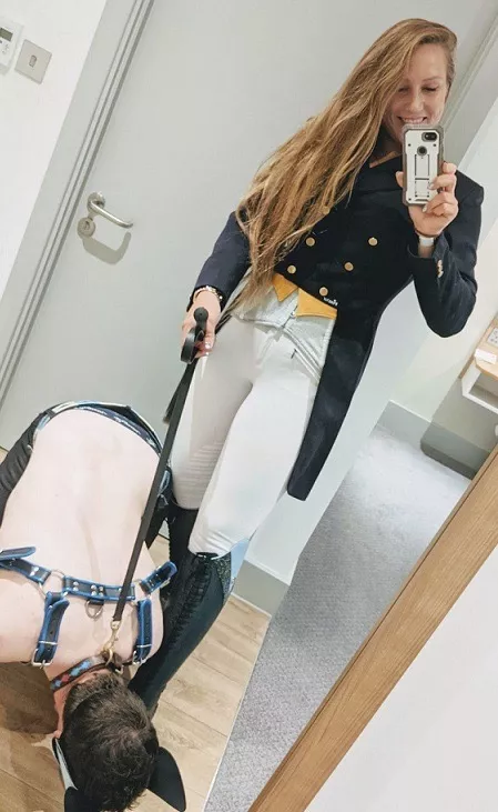 Her pet cleans Her Boots before She goes Riding posted by devoted95